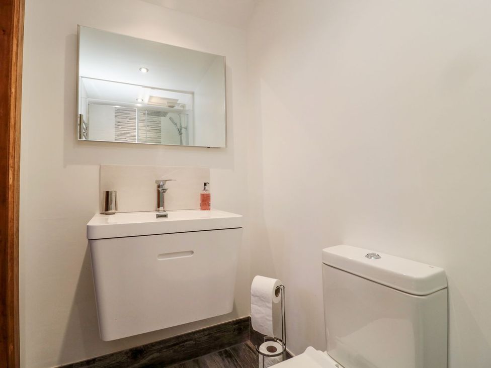 A bathroom with sink and toilet at Cygnet Cottage Berwick-upon-Tweed