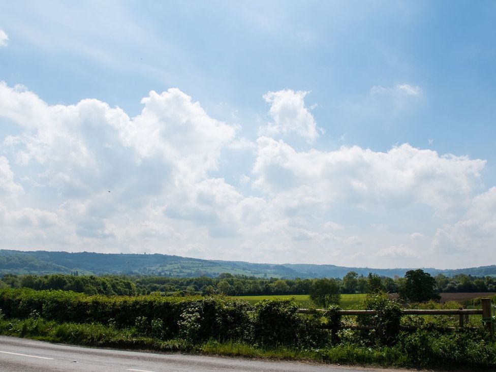 A landscape view of hills and fields at Glencoe Cottage in Broadway