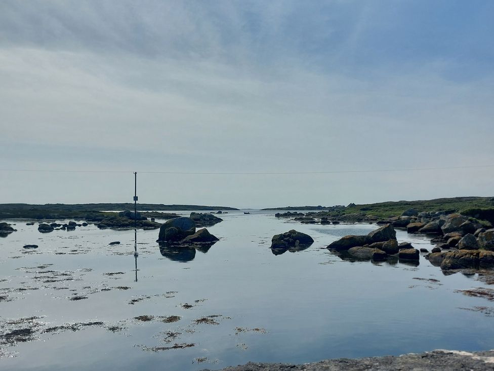 A view of water and rocks at Tigh Marie 