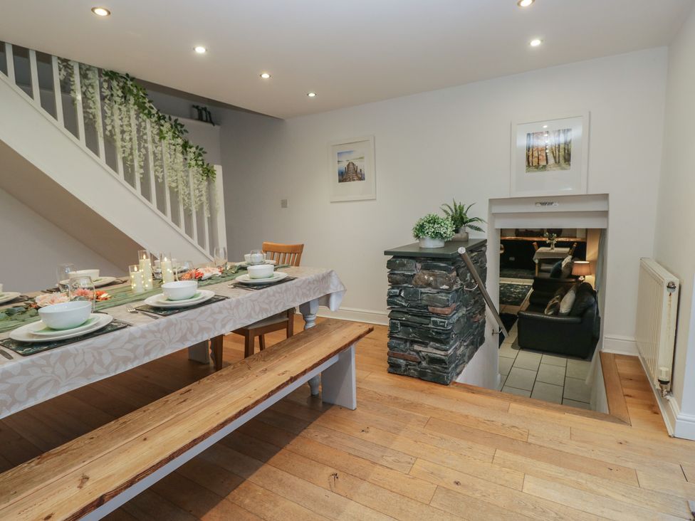 A dining room with a table and chairs at Newlands Fell House near Keswick