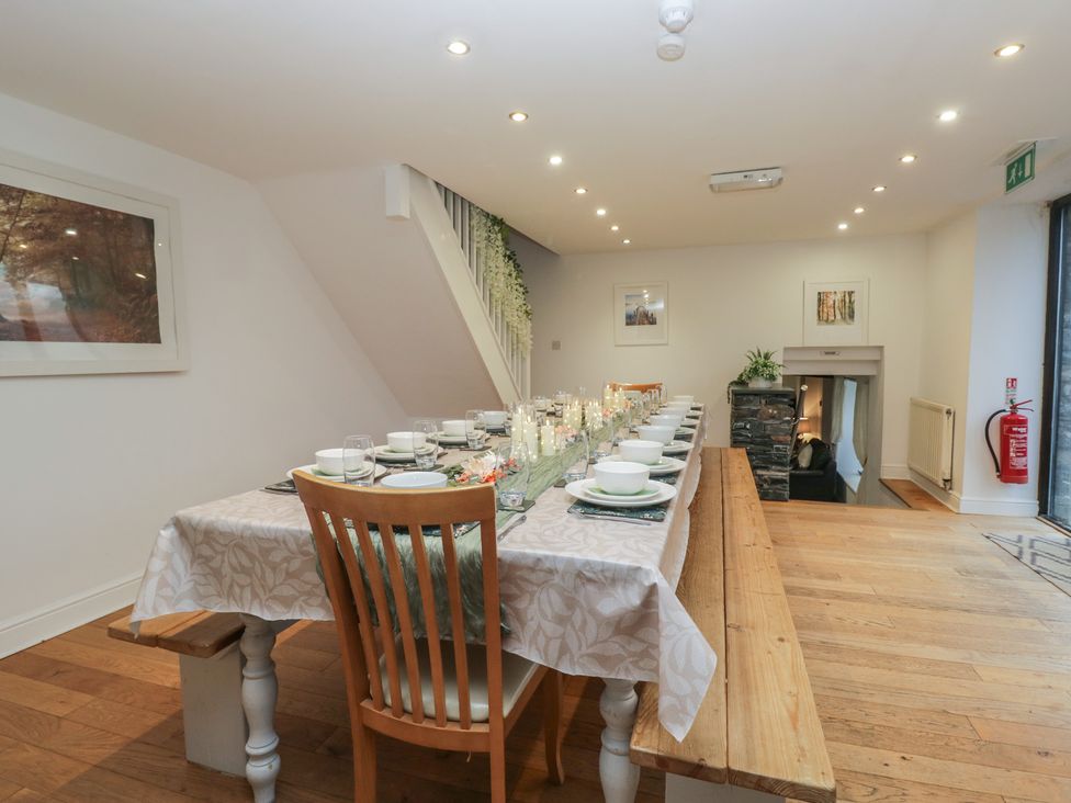 A dining room with a large table and chairs at Newlands Fell House in Newlands near Keswick