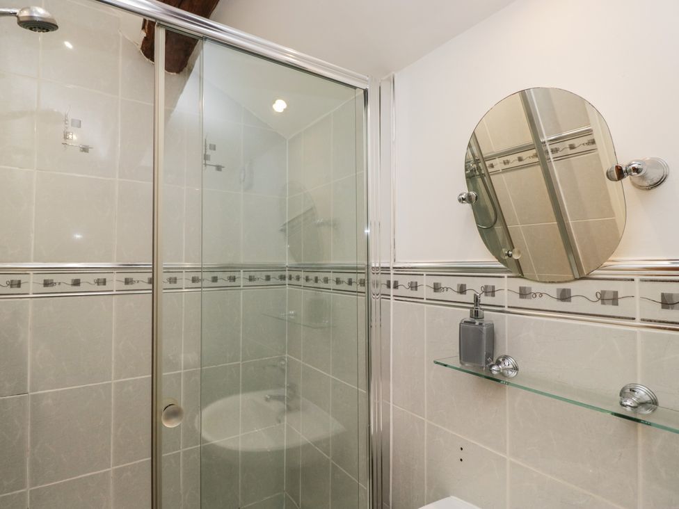 A shower and sink in a bathroom at Newlands Fell House in Newlands near Keswick