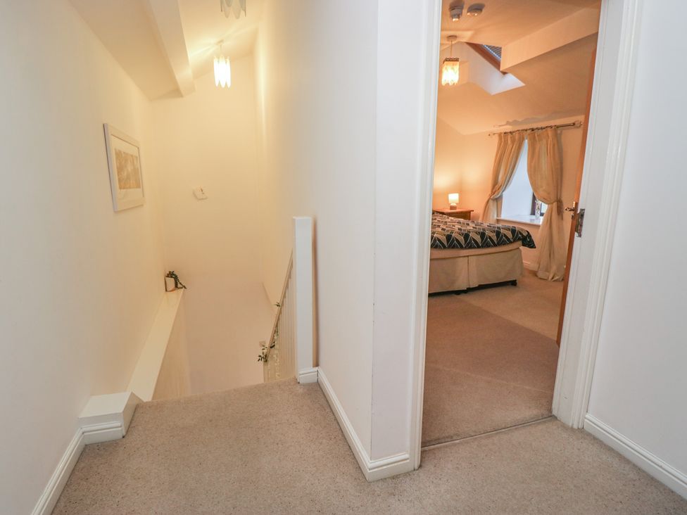 A hallway leading to a bedroom at Newlands Fell House in Newlands near Keswick