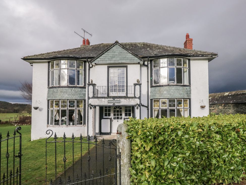 A house with windows and a balcony at Herdwick Croft in Bassenthwaite
