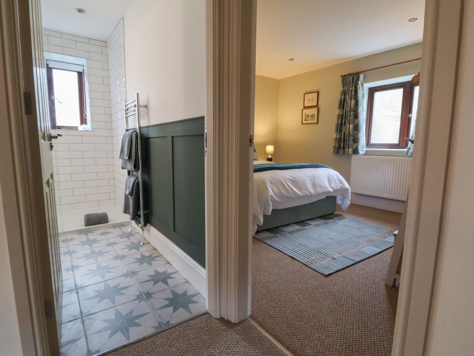 A bathroom and bedroom view at The Forge in Castleton, Peak District
