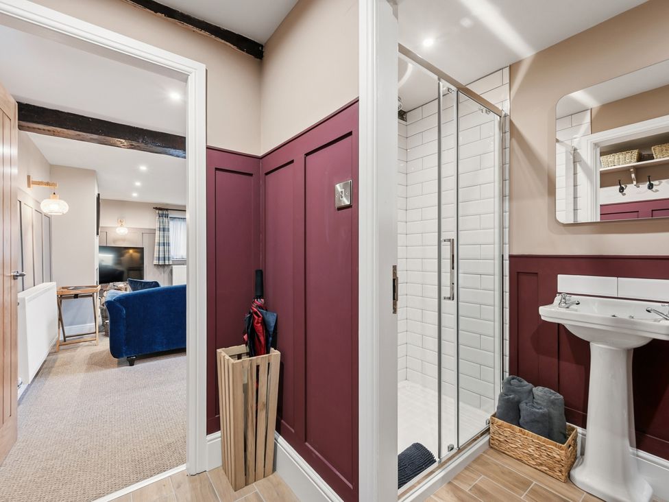 A bathroom with a shower and sink at The Forge in Castleton, Peak District
