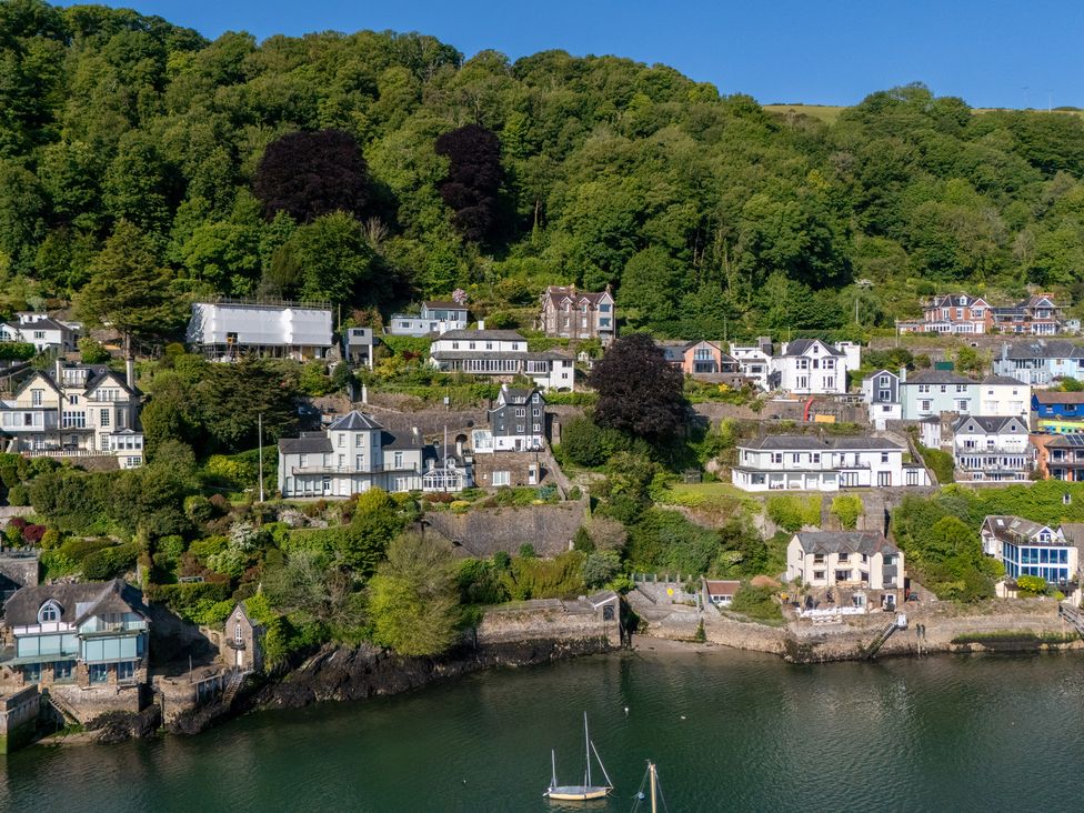 A view of houses along a riverbank in Dartmouth