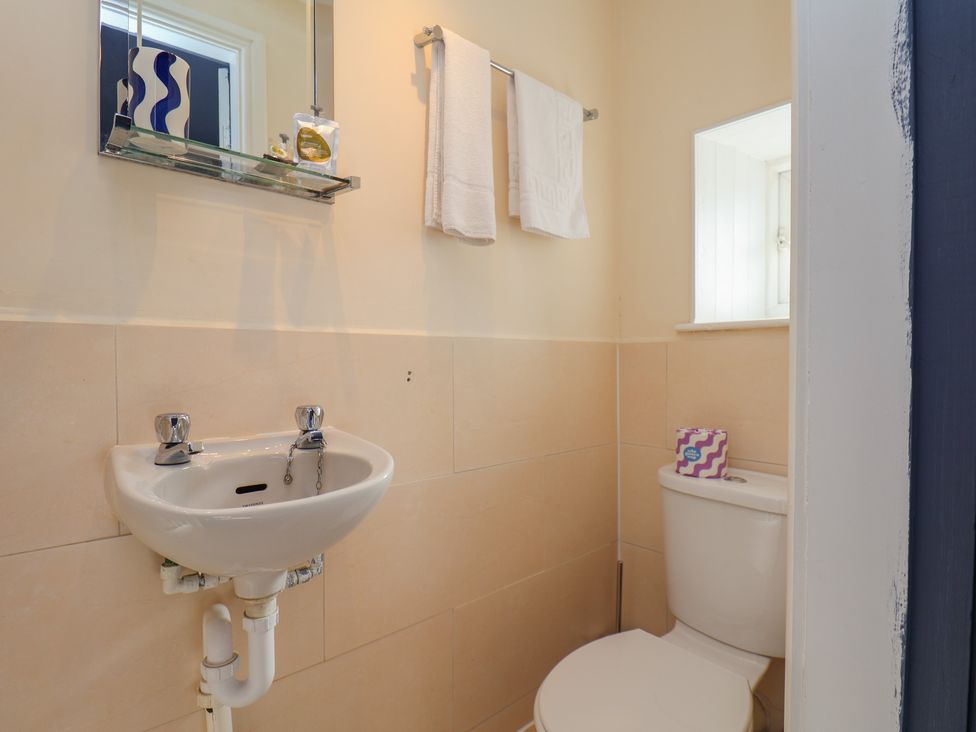 A bathroom with sink and toilet at Mulgrave House Hinderwell near Staithes