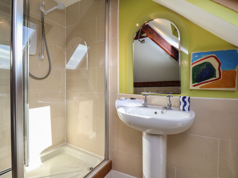 A bathroom with a shower and sink at Mulgrave House near Hinderwell Staithes