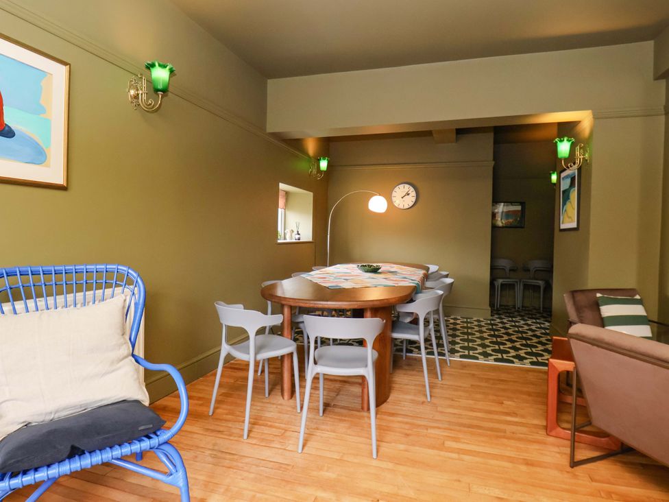 A dining room with a table and chairs at Mulgrave House in Hinderwell near Staithes