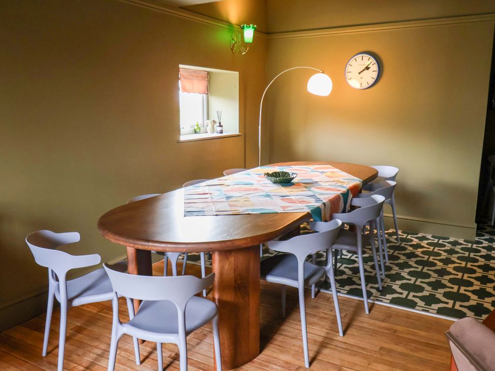 A dining room with a table and chairs at Mulgrave House Hinderwell near Staithes