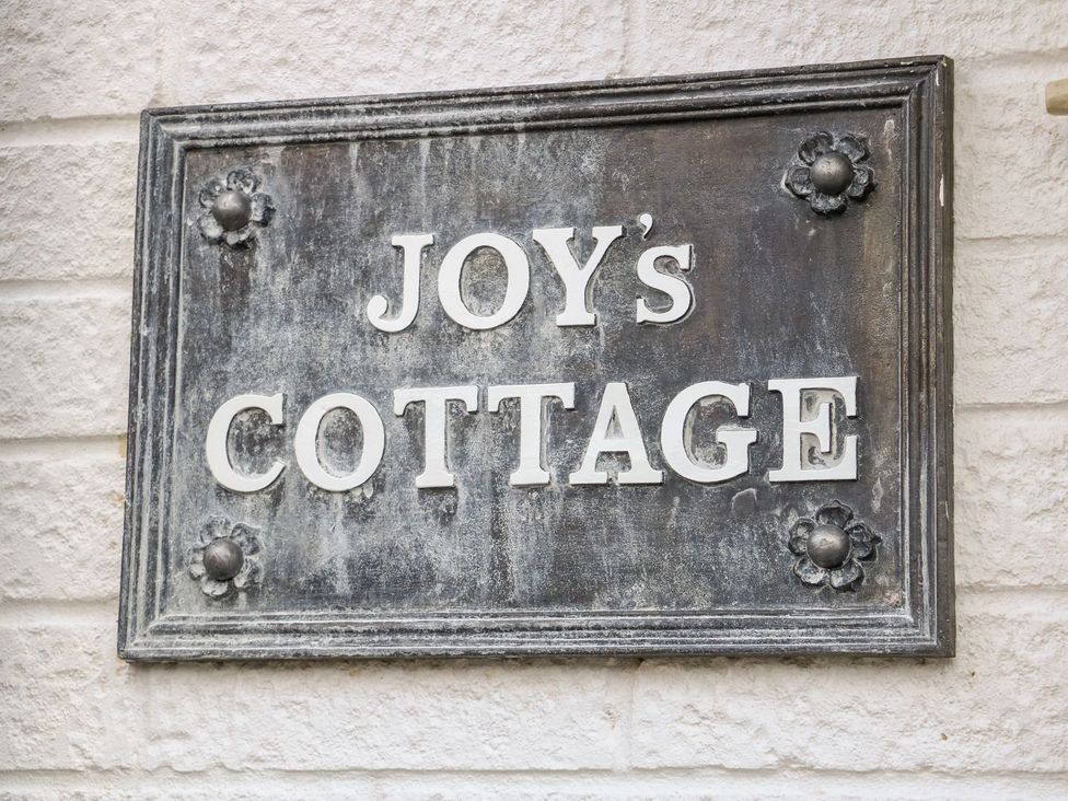 A sign for Joy's Cottage at Snettisham