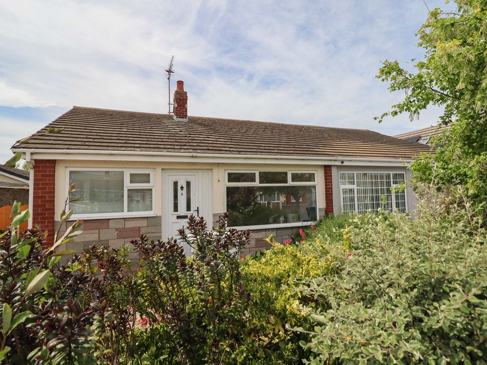 A bungalow with garden and front door at 6 Bastion Close Prestatyn