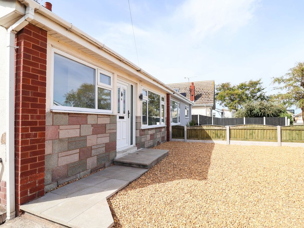 An exterior view of a house with a pathway at 6 Bastion Close in Prestatyn