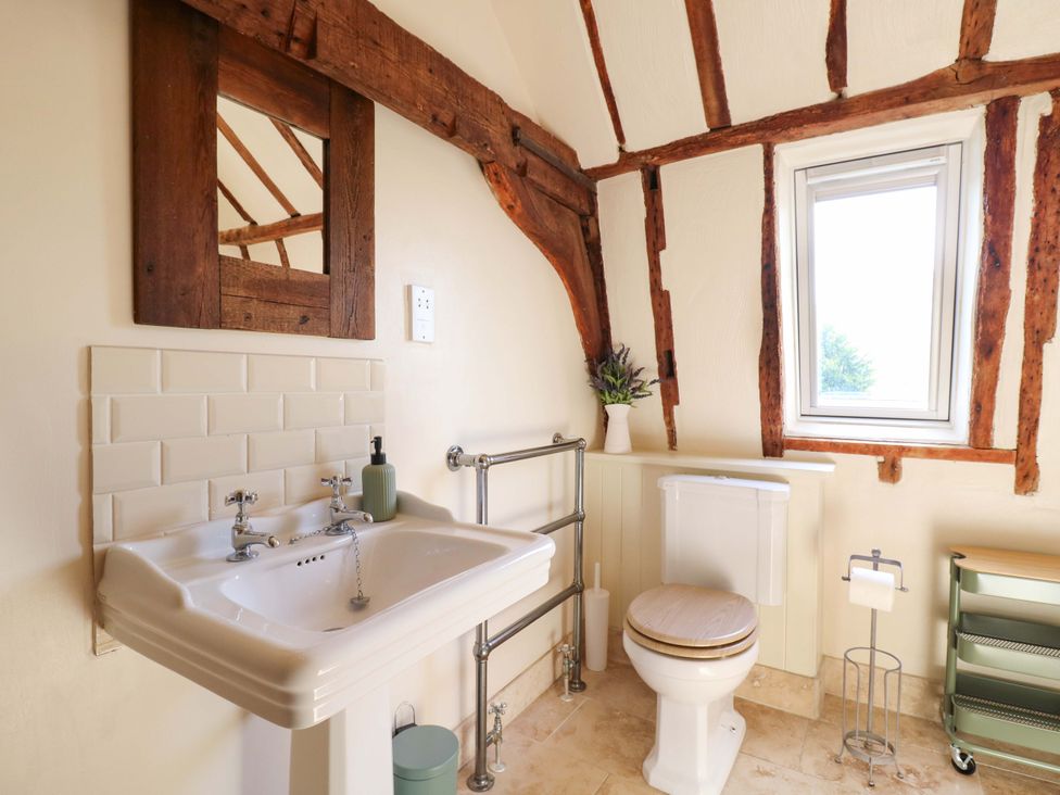 A bathroom with a sink and toilet at Six Apples in Wethersfield near Finchingfield