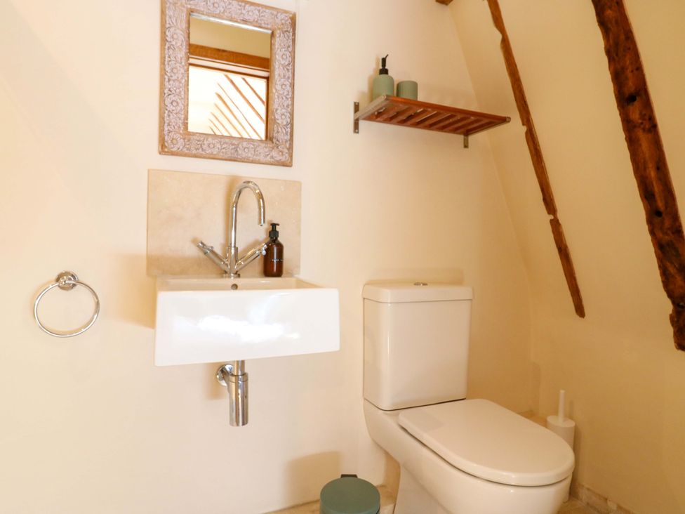 A bathroom with a sink and toilet at Six Apples in Wethersfield near Finchingfield