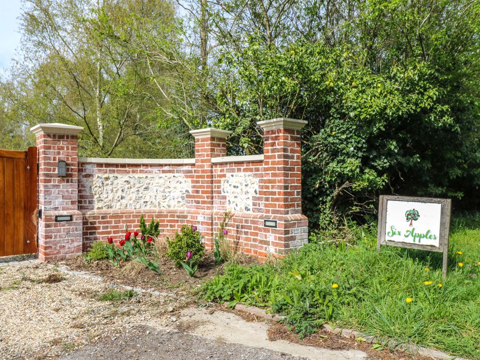 An entrance gate and sign at Six Apples in Wethersfield near Finchingfield
