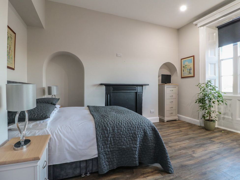 A bedroom with a bed and furniture at Unit 7 Apt 2 Sheffield