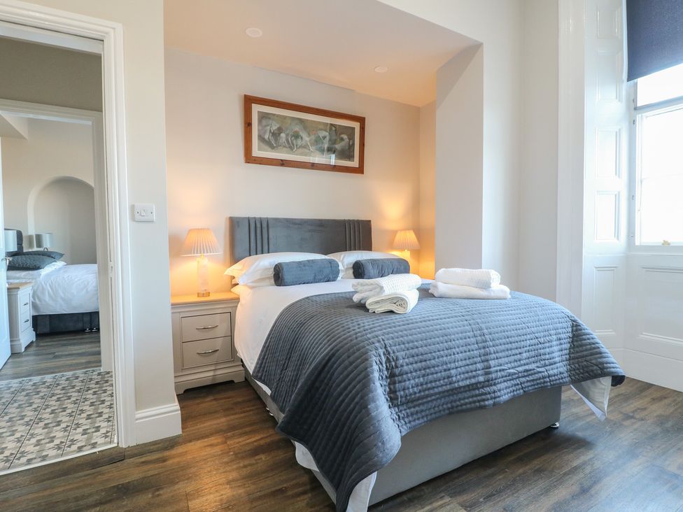 A bedroom with a bed and bedside table at Unit 7 Apt 2 Sheffield