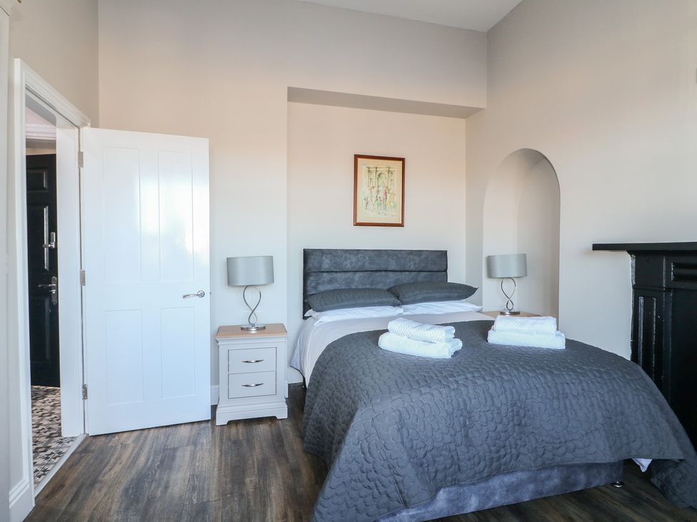 A bedroom with a bed and bedside table at Unit 7 Apt 2 in Sheffield