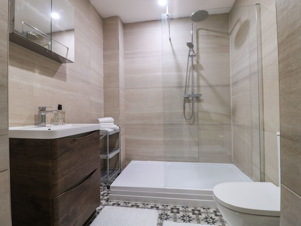 A bathroom with a shower, sink, and toilet at Unit 7 Apt 2 in Sheffield