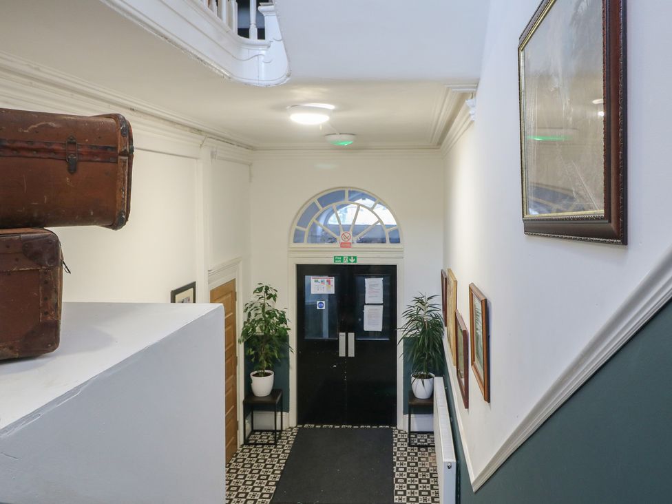 An entrance hall with luggage and plants at Unit 7 Apt 3, Sheffield