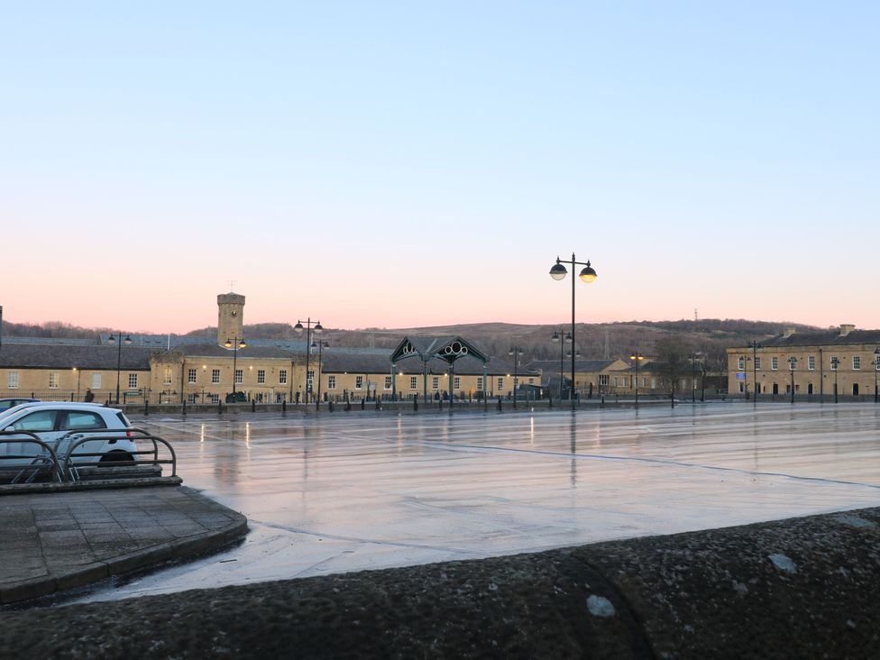 An outdoor photo of buildings and empty parking lot at Unit 7 Apt 3 Sheffield