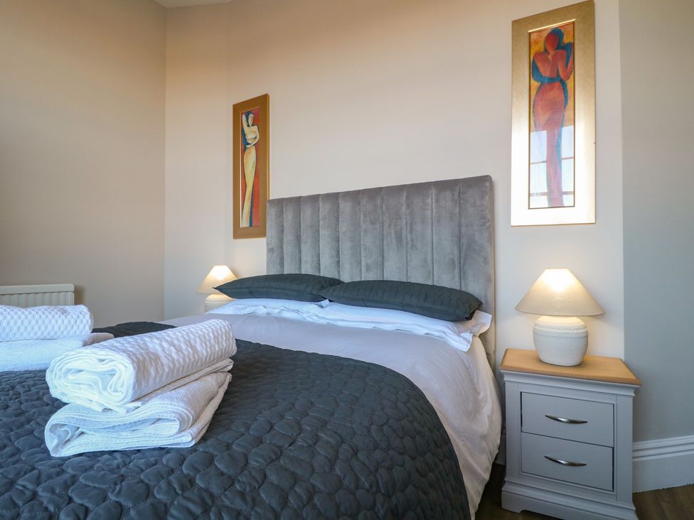 A bedroom with a bed and bedside table at Unit 7 Apt 3 Sheffield