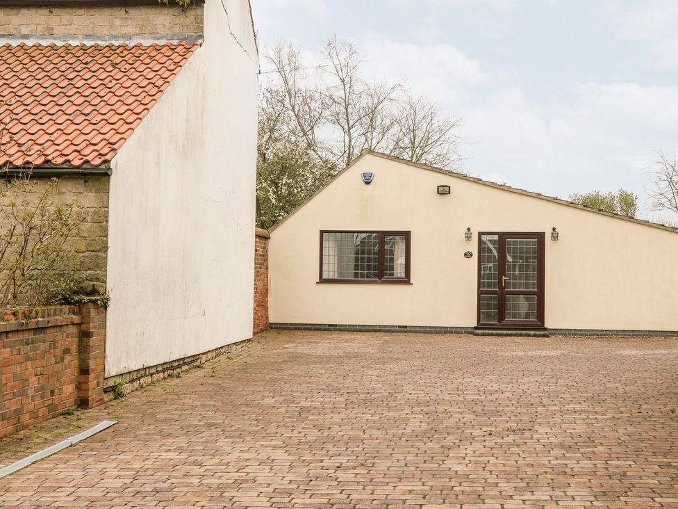 A building with a door and window outdoors at Millers Retreat in Chesterfield