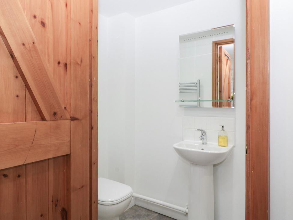 A bathroom with a sink and toilet at Horse Gin in Lydney