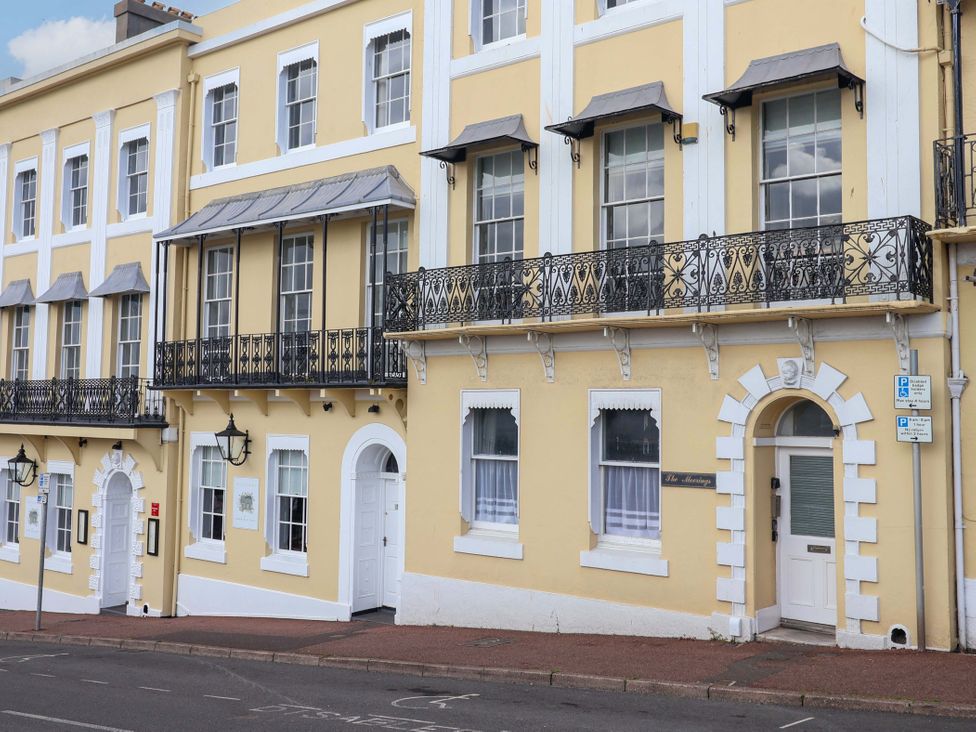 A building with balconies and windows at Flat 2 The Moorings in Torquay