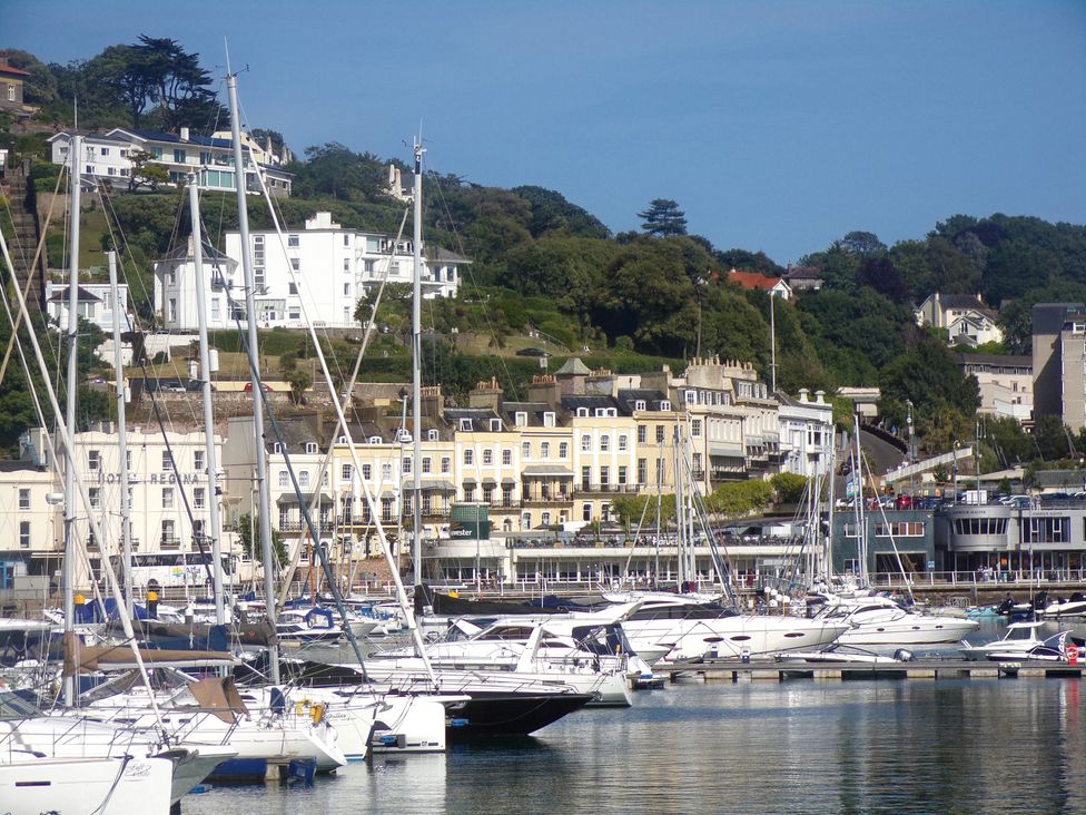 A marina with boats and buildings at Flat 2 The Moorings Torquay