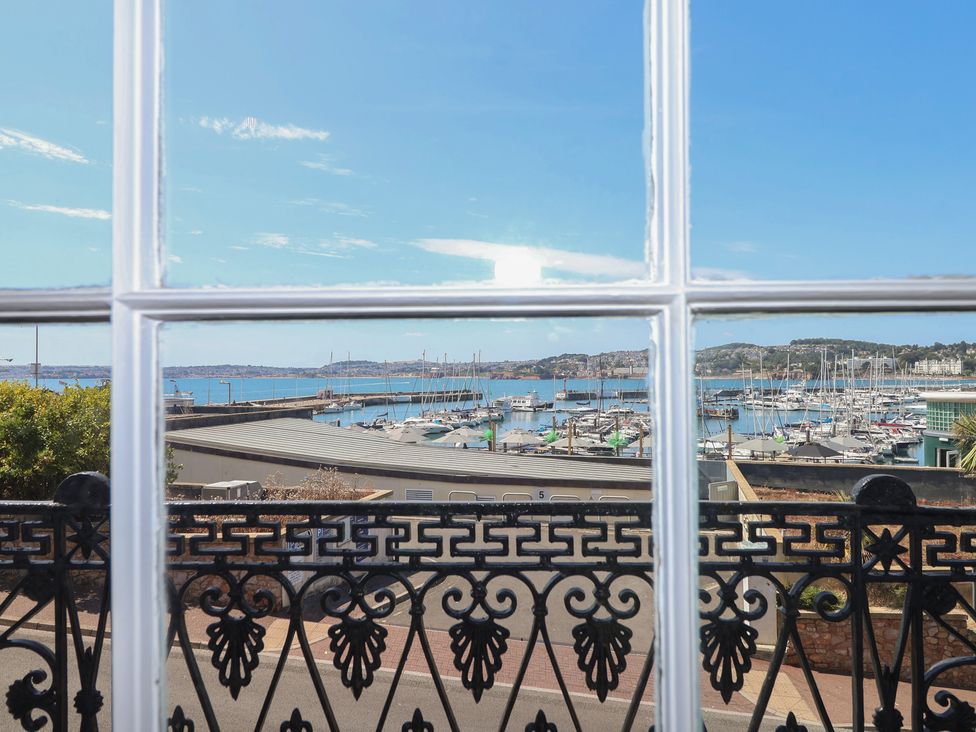 A view of the marina with boats and water at Flat 2 The Moorings in Torquay