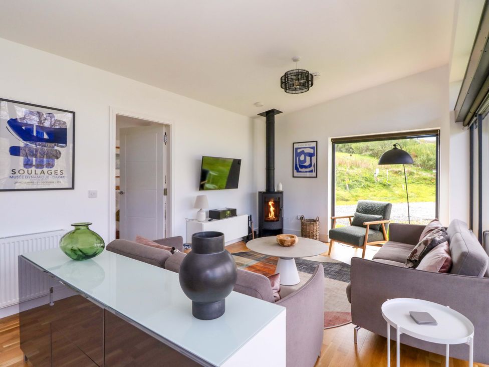 A living room with a sofa and coffee table at Strathview