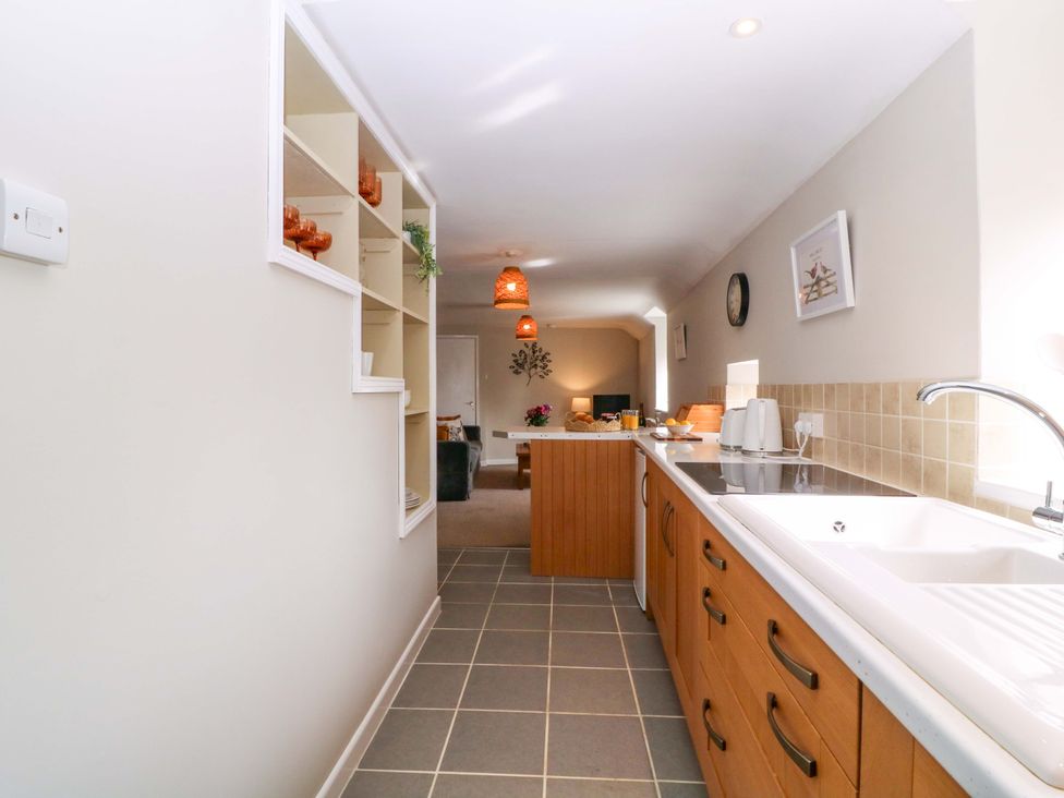 A kitchen with a sink and countertop at Farm View Annex in Painswick