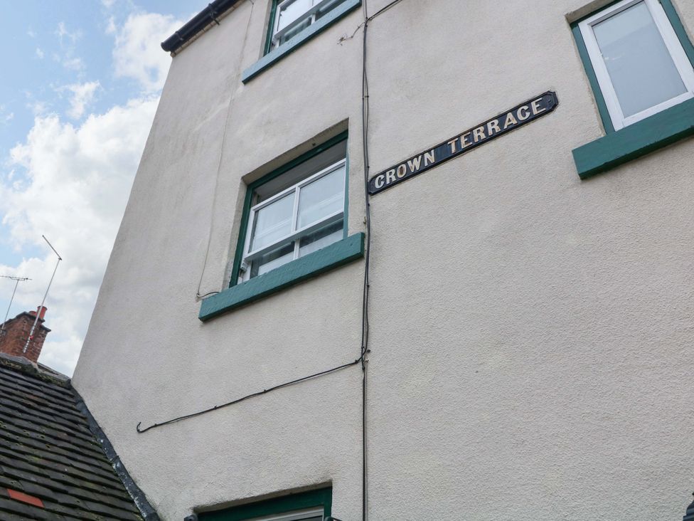 A building with a sign stating Crown Terrace at 14 Crown Terrace in Belper