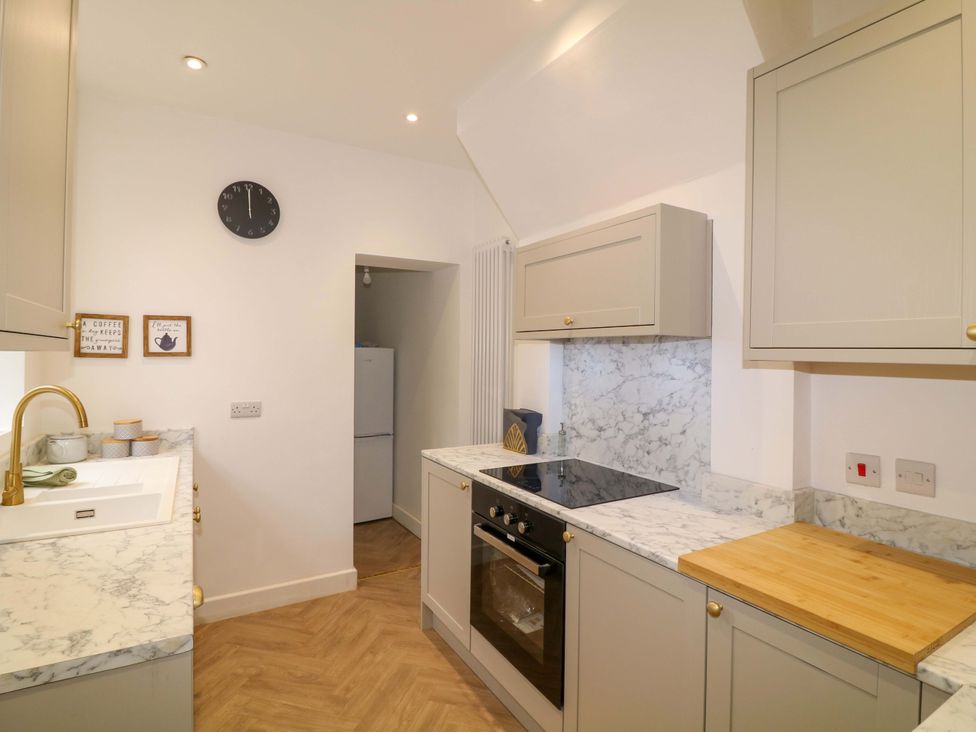 A kitchen with countertop and appliances at 14 Crown terrace in Belper
