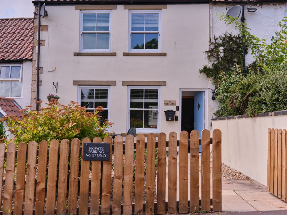 A house with a front yard and parking sign at 27 West Green in Heighington