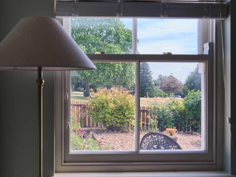 A view from a window of a garden at 27 West Green Heighington