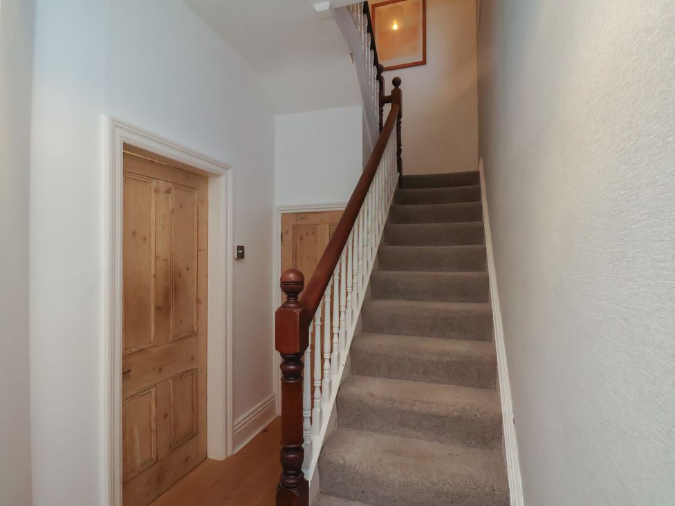 A staircase in a hallway at South Villa in Sandsend near Whitby