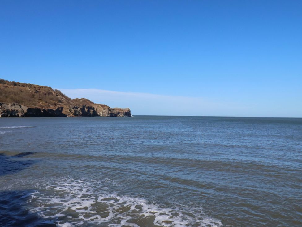 A view of the sea and cliffs at South Villa Sandsend near Whitby