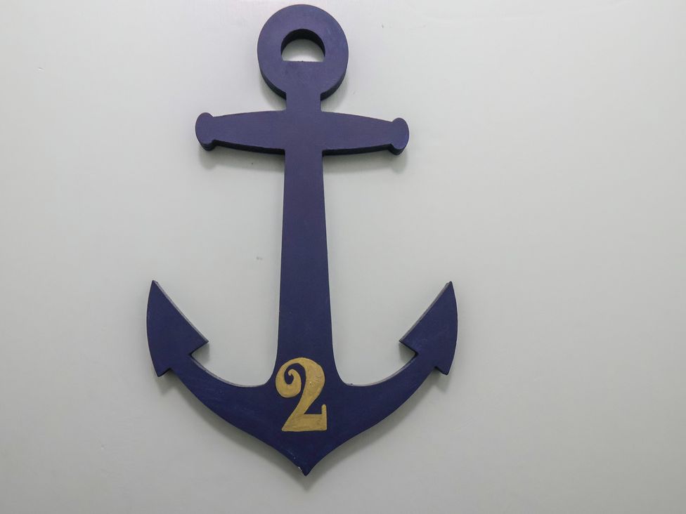 A decorative anchor with the number 2