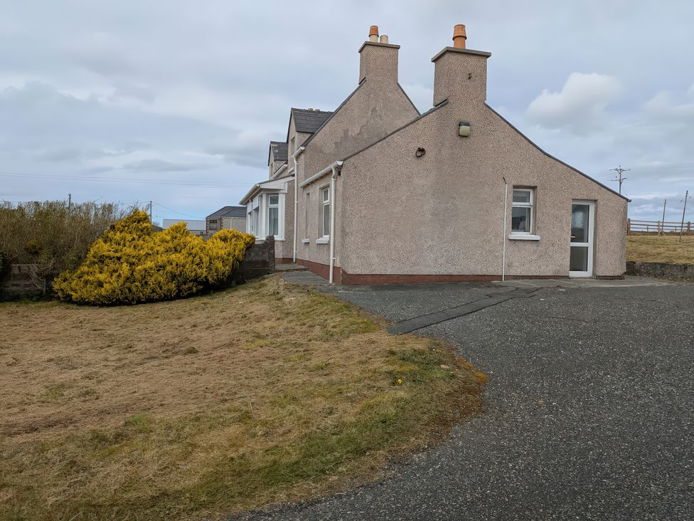 A house with a garden area and path at 15 New Shawbost, Shawbost