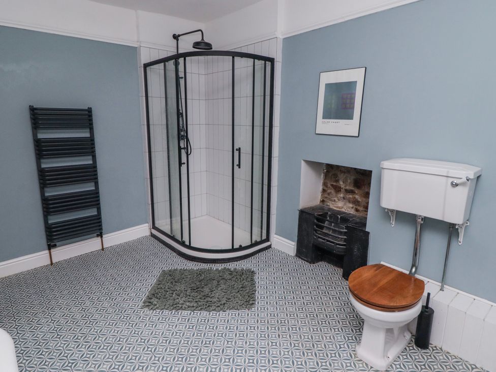 A bathroom with a shower and toilet at The Secret Garden in Narberth