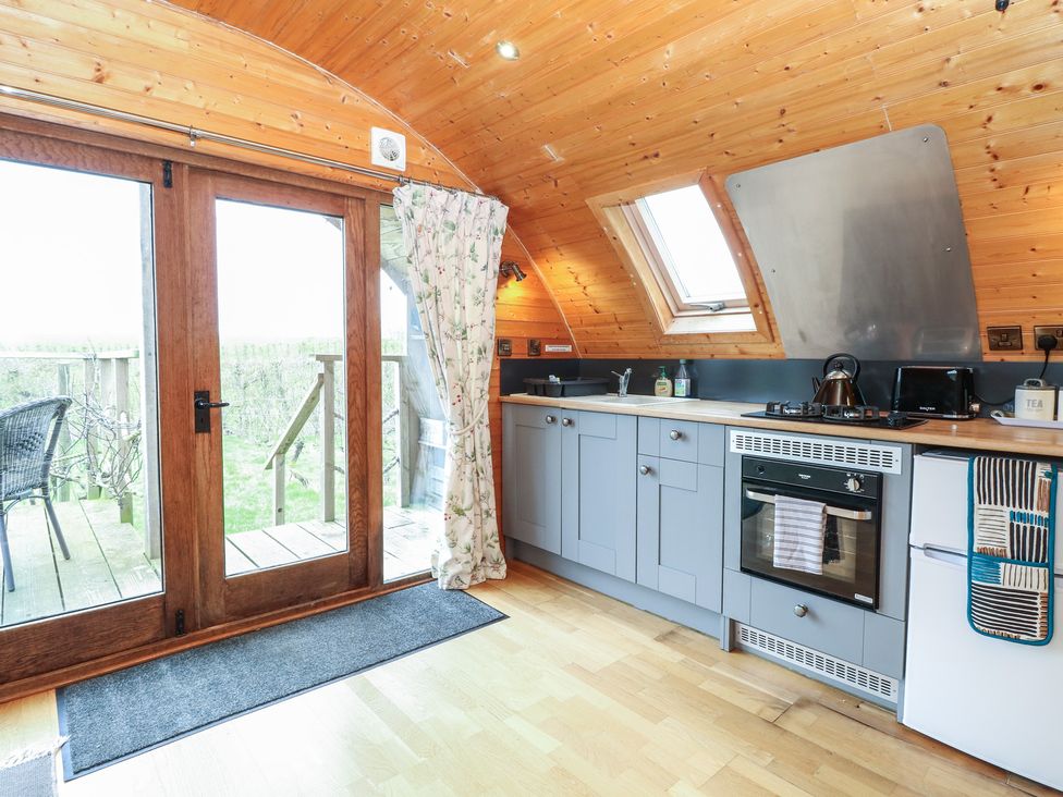 A kitchen with a sink and appliances at Vine View near Halesworth