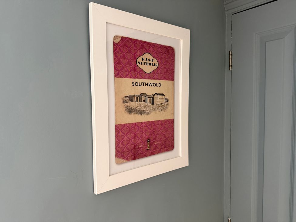 A framed picture of East Suffolk and Southwold on the wall at York Cottage Southwold
