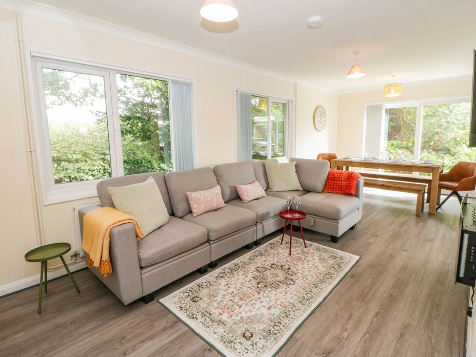 A living room with a sofa and coffee table at The Croft in Llandrindod Wells