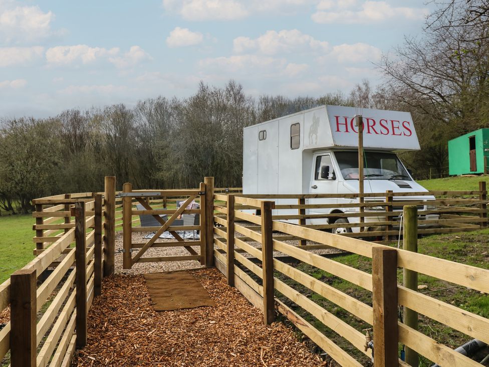 An outdoor area with a horse trailer and fenced pathway at The Horse Box in Blaydon-on-Tyne