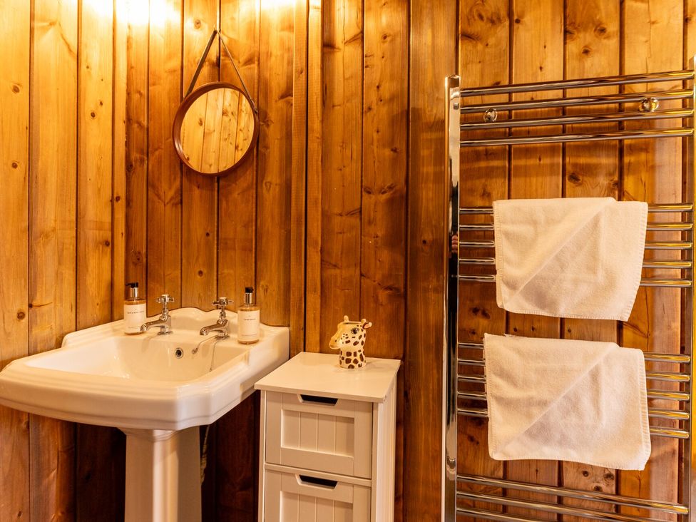 A bathroom with a sink and towel rack at Kruger (Pet) in Penrith