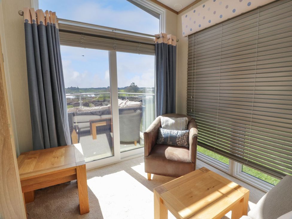 A snug with an armchair and table at 1, Fisherman’s hill